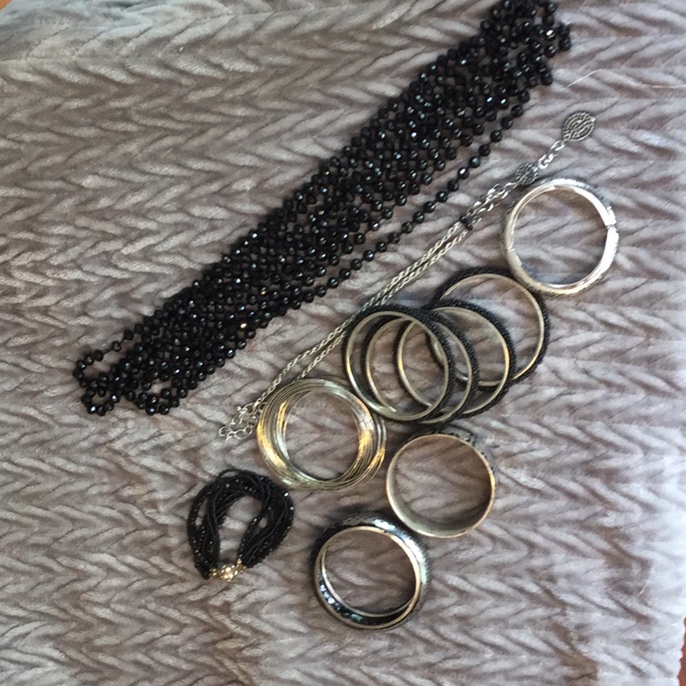 Silver and black bundle of bangles and necklaces